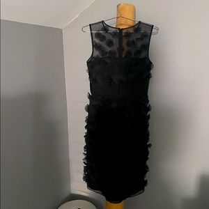 Beautiful black sleeveless evening dress. Size xs to small. Covered with petals.